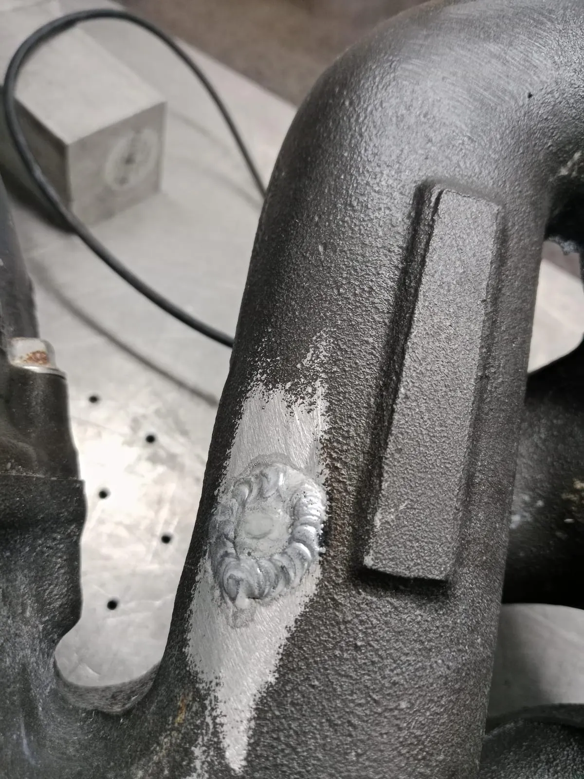 Colector de escape reparado